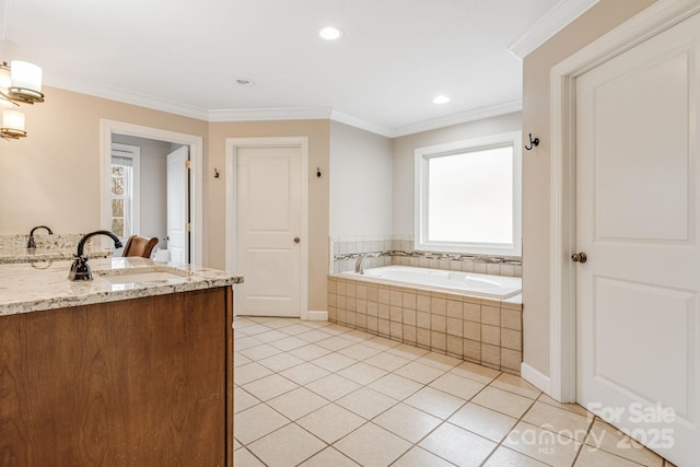 bathroom with tile patterned floors, vanity, ornamental molding, and tiled bath