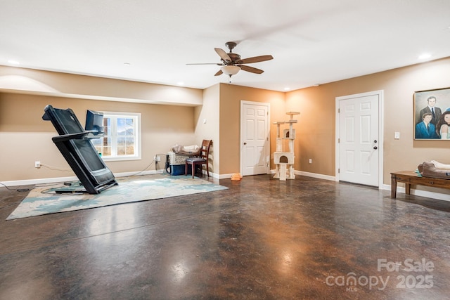 exercise room featuring ceiling fan