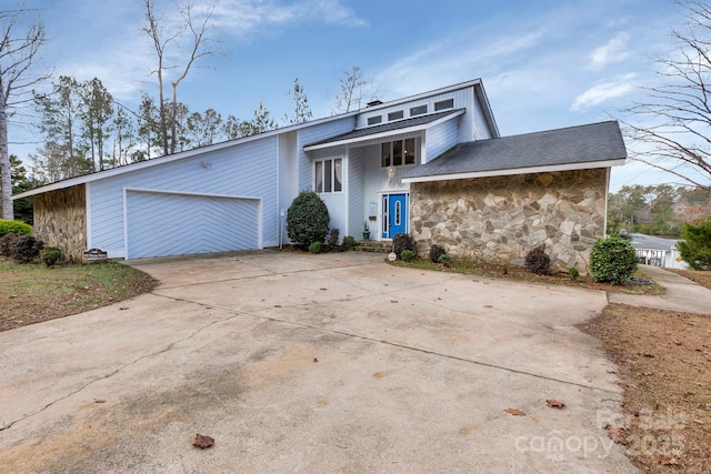 view of front of property featuring a garage