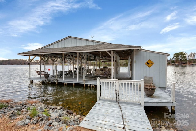 dock area featuring a water view