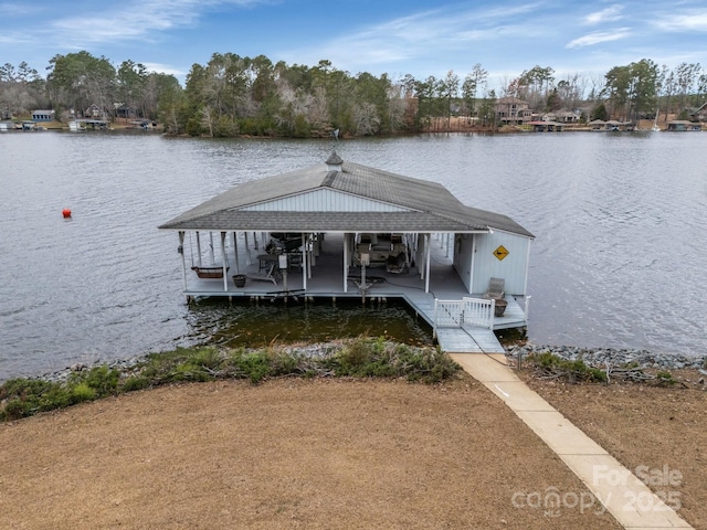 dock area featuring a water view