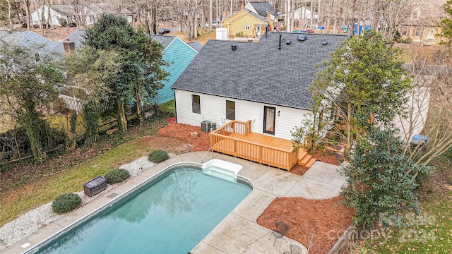 exterior space featuring a patio, central AC unit, and a wooden deck