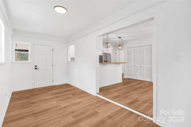 entrance foyer with hardwood / wood-style floors