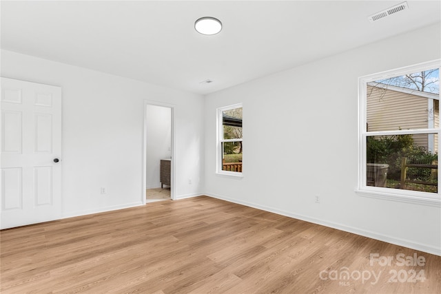 interior space featuring light hardwood / wood-style flooring and a wealth of natural light