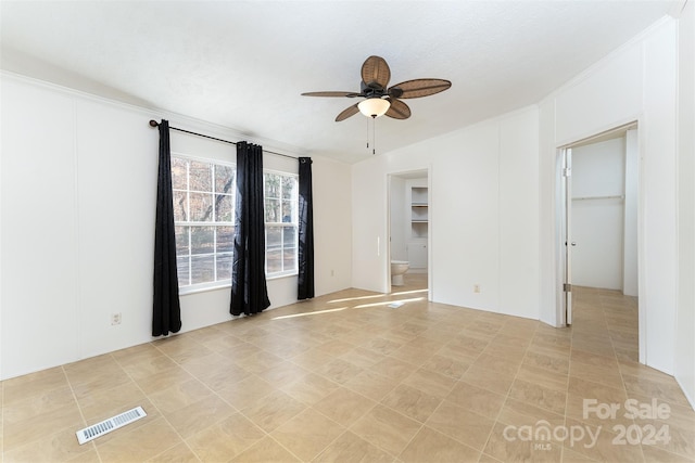 empty room with ceiling fan