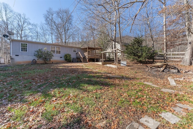 view of yard featuring a deck