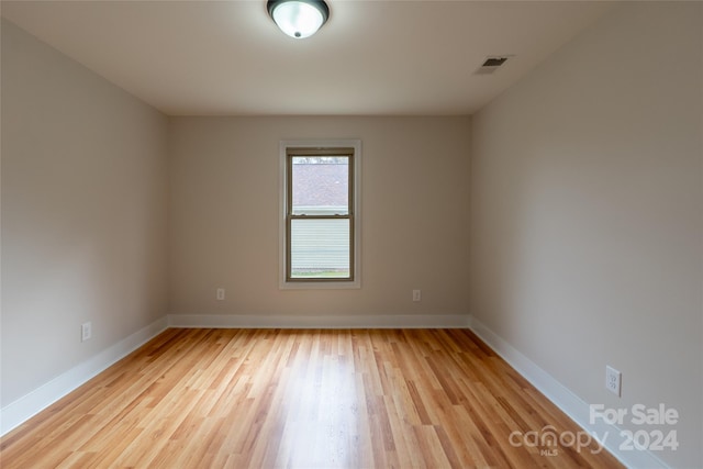 empty room featuring light hardwood / wood-style floors