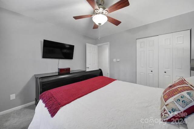 bedroom featuring carpet floors, a closet, and ceiling fan