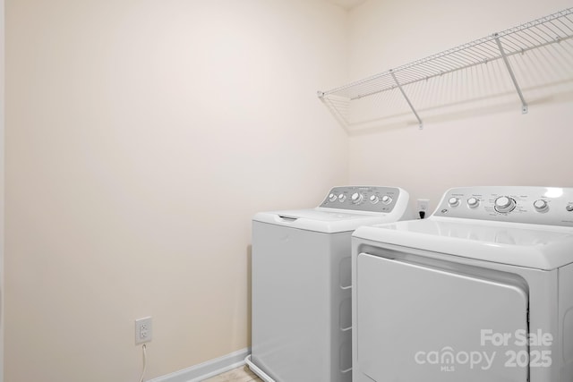 laundry room featuring independent washer and dryer