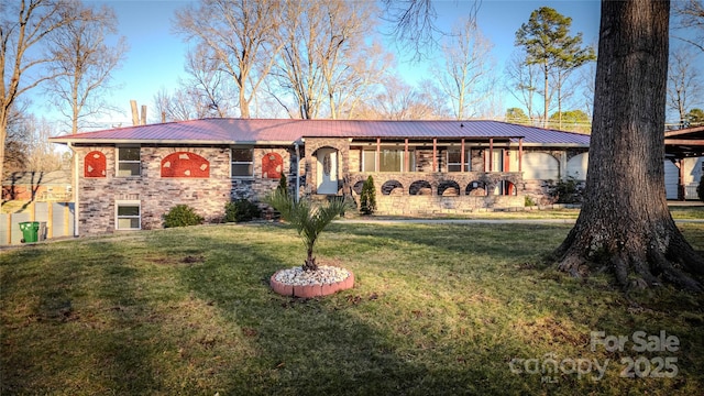 ranch-style house with a front yard