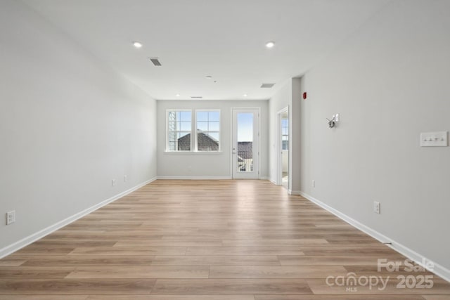 empty room featuring light hardwood / wood-style floors