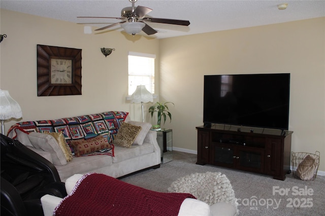 living room featuring light colored carpet and ceiling fan