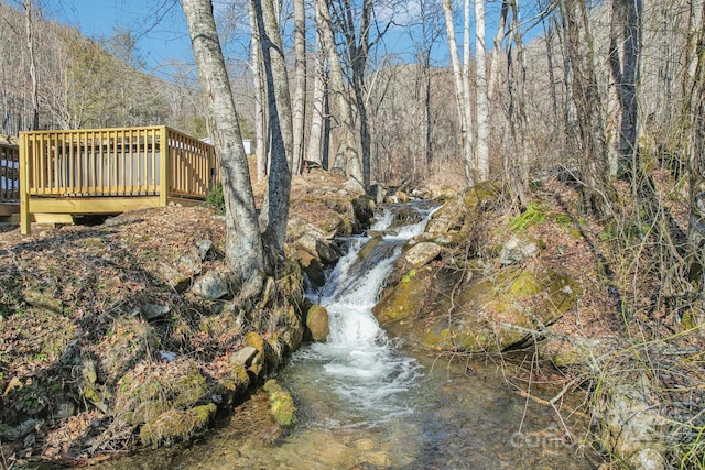 view of yard with a deck