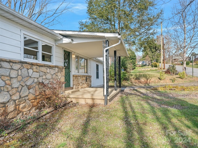 exterior space with a lawn