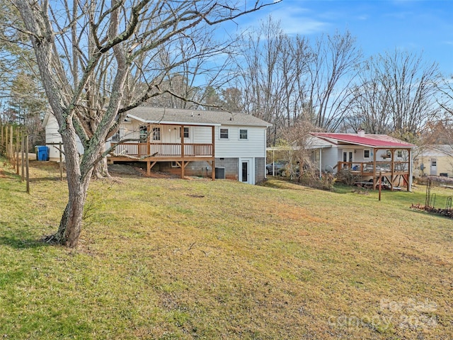 view of yard with a deck