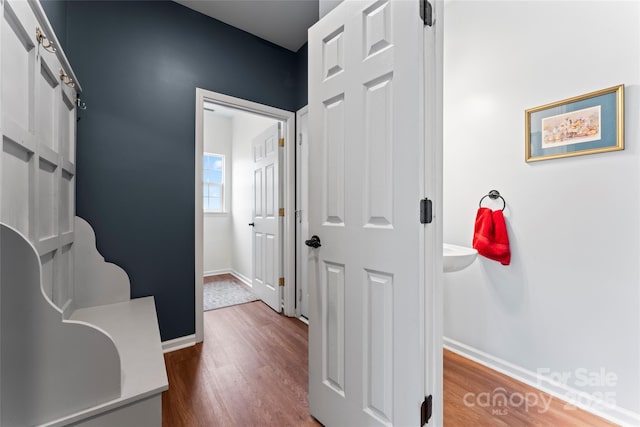 hallway featuring hardwood / wood-style floors