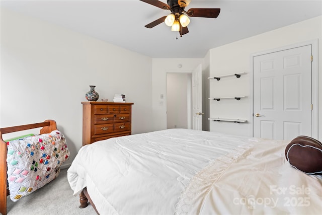 bedroom featuring carpet and ceiling fan