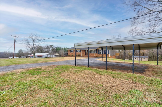 view of yard featuring a carport