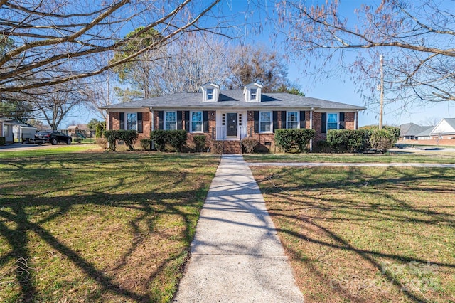 ranch-style home with a front yard