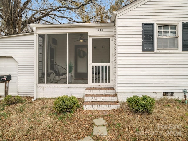 property entrance with a garage