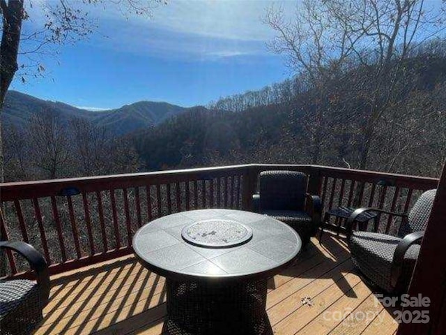 deck with a mountain view