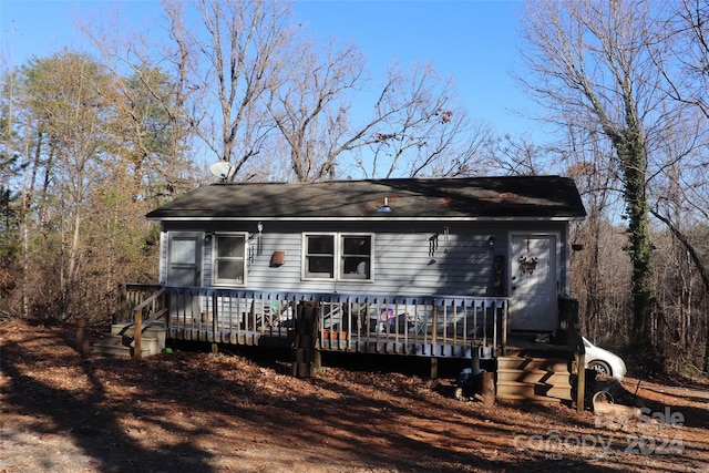 view of front of property featuring a deck