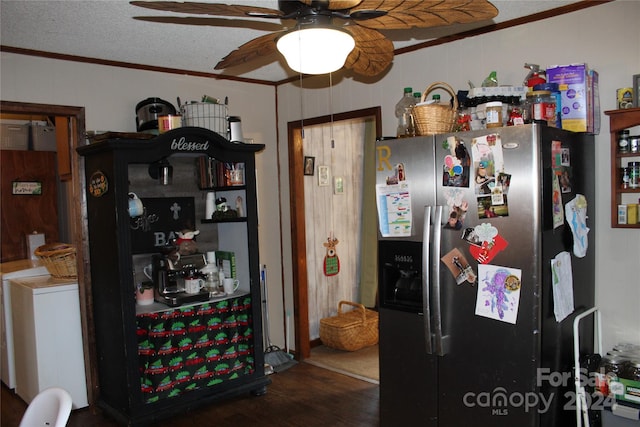 kitchen with dark wood-type flooring, stainless steel refrigerator with ice dispenser, and ornamental molding