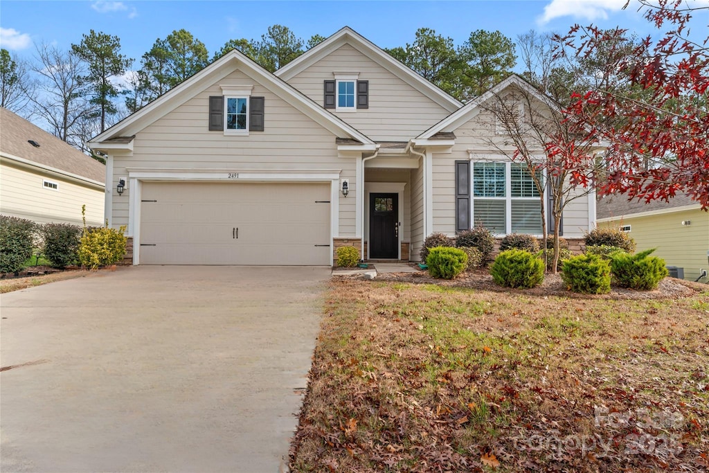 craftsman inspired home featuring a garage