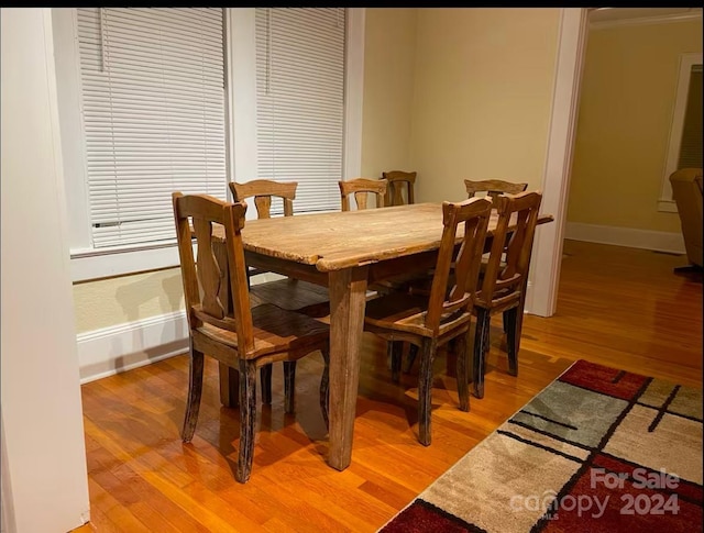 dining room with hardwood / wood-style floors