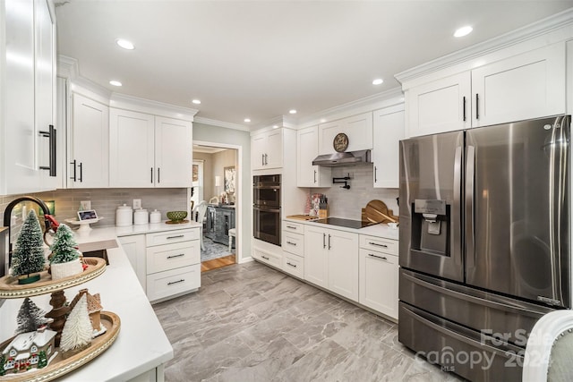 kitchen featuring double oven, decorative backsplash, stainless steel fridge with ice dispenser, and white cabinets