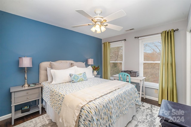 bedroom featuring ceiling fan and hardwood / wood-style flooring