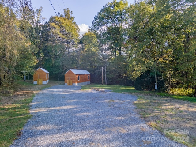 exterior space featuring an outbuilding