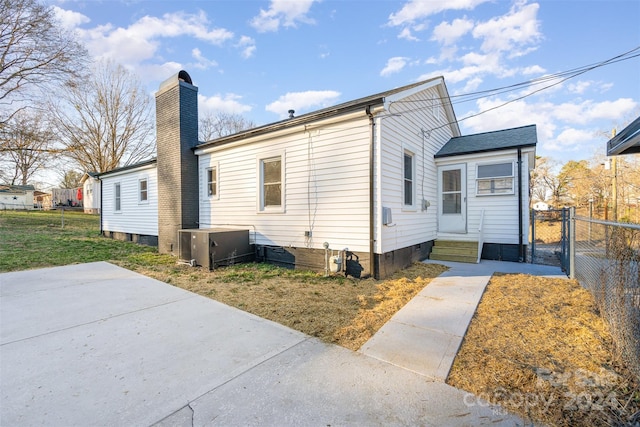 view of front of property with central AC unit