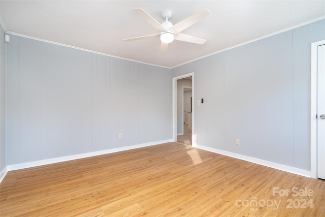 unfurnished room with ceiling fan, light hardwood / wood-style floors, and crown molding