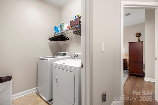 laundry area with washer and clothes dryer