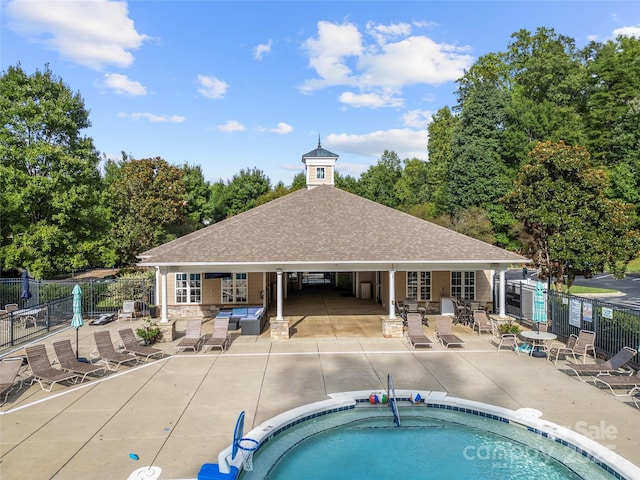 view of swimming pool featuring a patio area