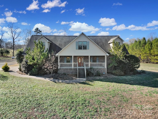 view of front of house featuring a porch and a front yard