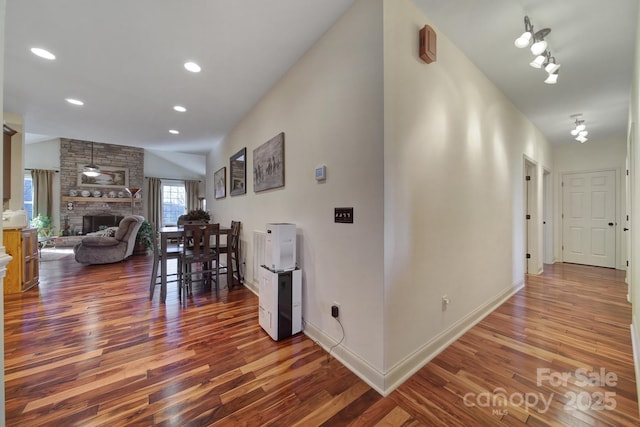 hallway with wood-type flooring