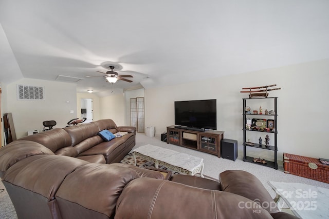 living room with carpet flooring and ceiling fan