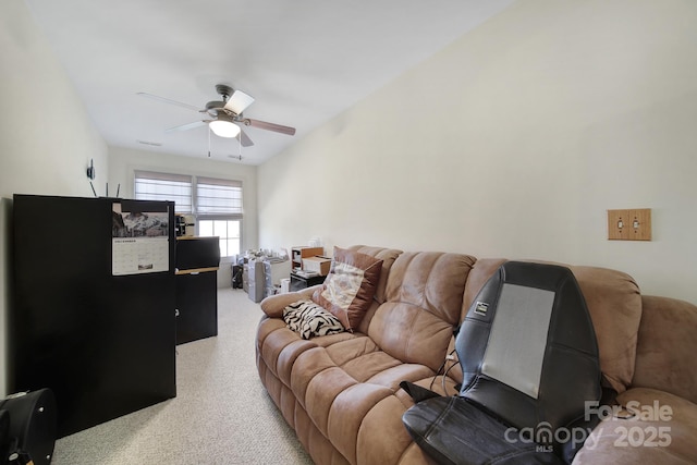 living room with carpet flooring and ceiling fan