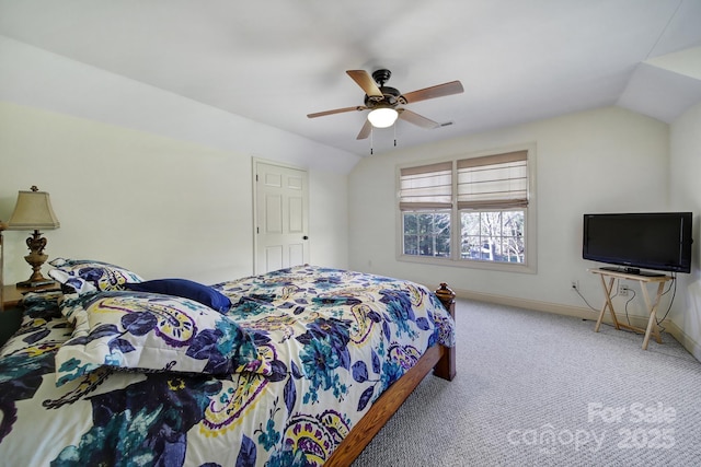 carpeted bedroom with ceiling fan and lofted ceiling