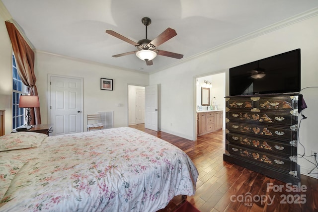 bedroom with connected bathroom, ceiling fan, dark hardwood / wood-style floors, and ornamental molding