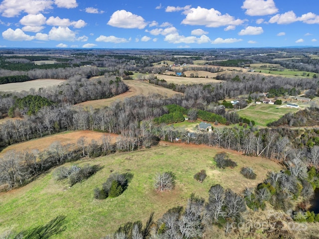 birds eye view of property featuring a rural view