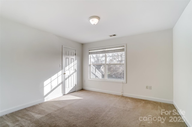 empty room with light carpet