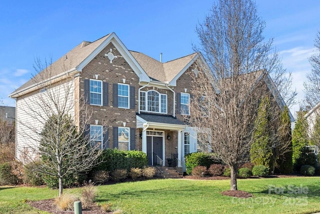 view of front facade with a front lawn