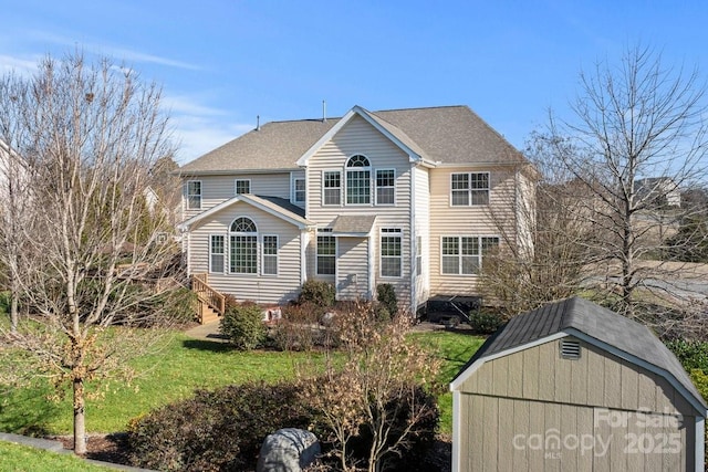 exterior space featuring a shed and a yard