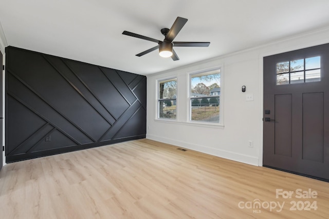 entrance foyer featuring ceiling fan, a healthy amount of sunlight, and light hardwood / wood-style floors