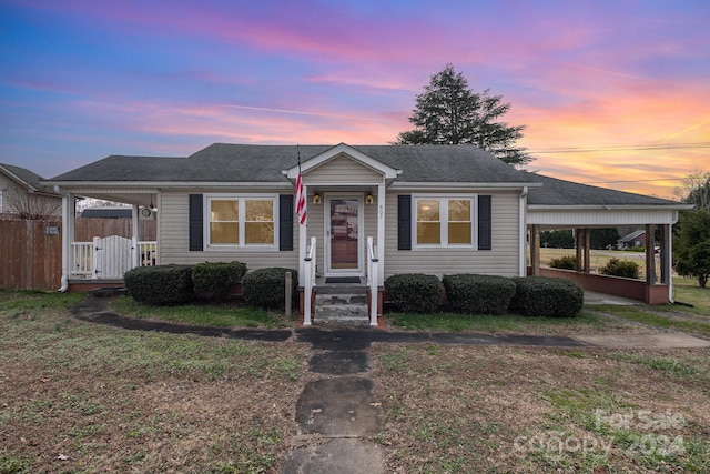 view of front of home featuring a carport