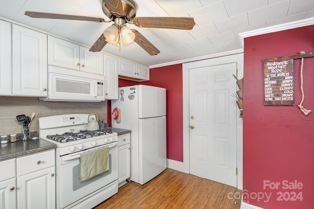 kitchen featuring tasteful backsplash, white appliances, ceiling fan, light hardwood / wood-style flooring, and white cabinets