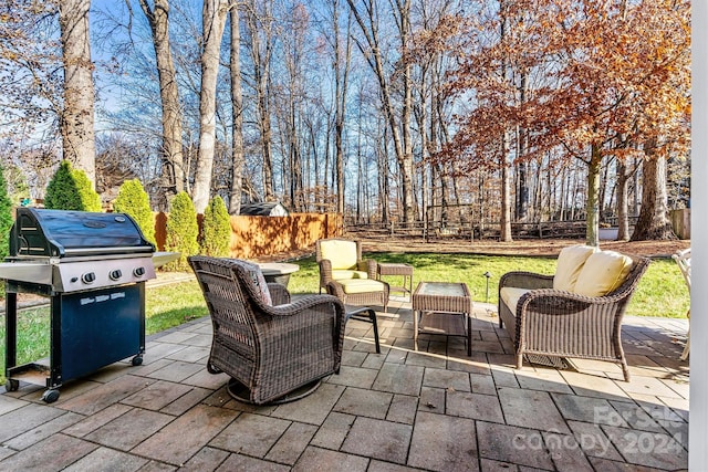 view of patio featuring an outdoor living space and grilling area